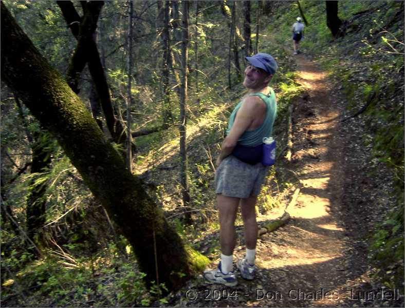 <s>Steve Jaber</s> Anonymous runner, taking a water stop