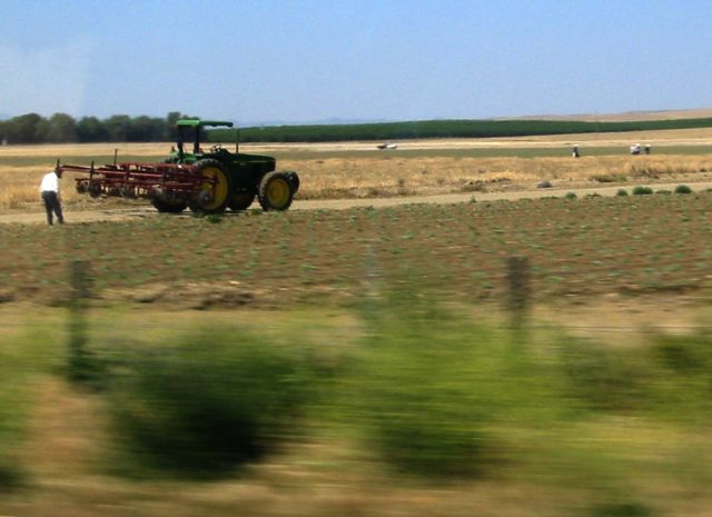 Central Valley farmer, checking the equipment